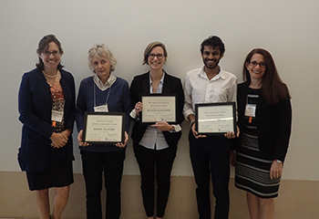 Five people posing next to each other, three of which were honored by The American Society for Emergency Contraception & The International Consortium for Emergency Contraception.