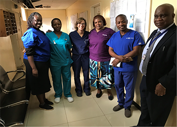 Dr. Alison Edelman posing with collaborators from the University Teaching Hospital Lusaka Zambia.