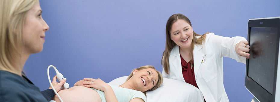 Dr. Erin Madriago (right) is a pediatric and fetal cardiologist 