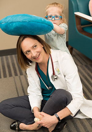 Foxy Kusin with Doernbecher’s Dr. Holmes, her heart specialist