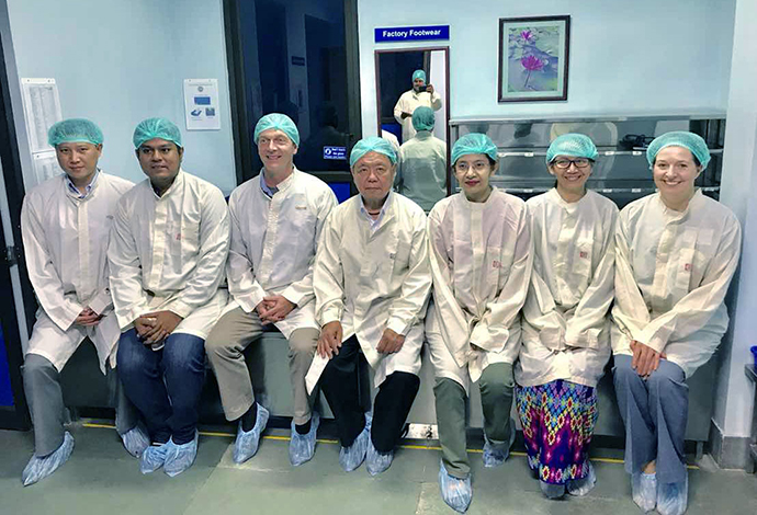 Doctors from Casey Eye Institute and Mandalay Eye Hospital pose together while training in India.