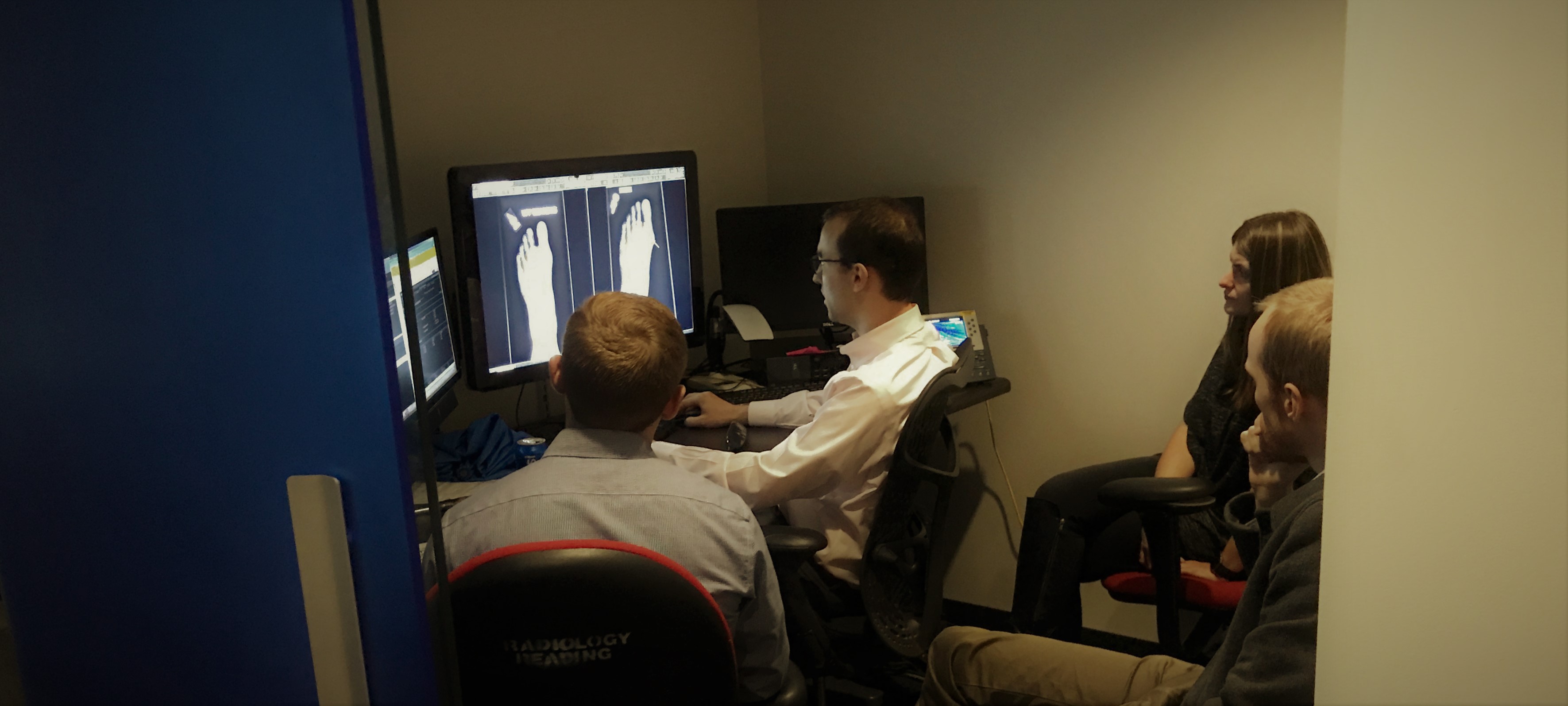 Bryan Wolf, Diagnostic Radiology, teaching medical students at a PACS station