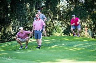15th Annual Department of Surgery Golf Tournament - golfers on green