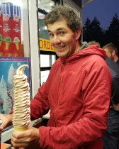 Adam Oken with a large Ice cream cone