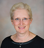 A professional photo of Dr. Debbie Lewinsohn.
