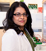 A professional photo of Dr. Monika Davare.