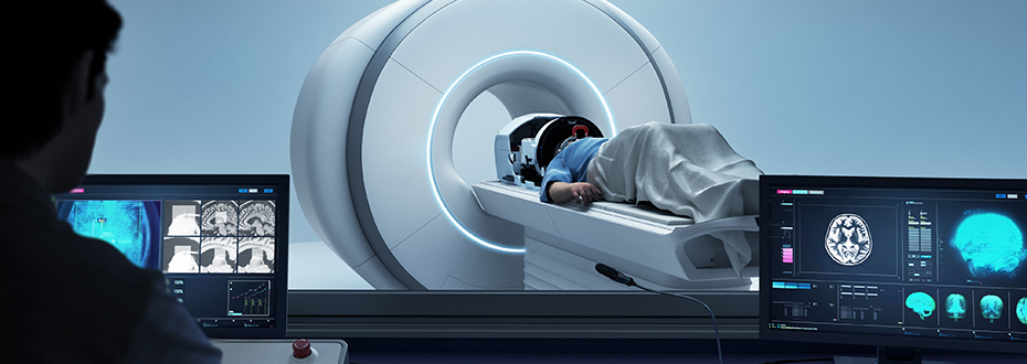 A patient being scanned in an MRI machine while a technician oversees.