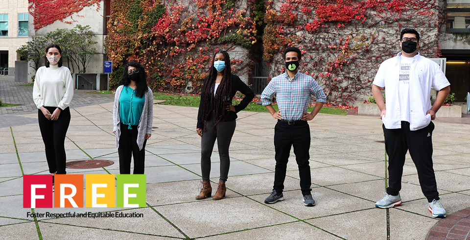Postbac students outside wearing surgical masks