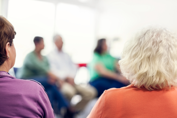 Type 2 diabetes support group-people sitting in a circle talking