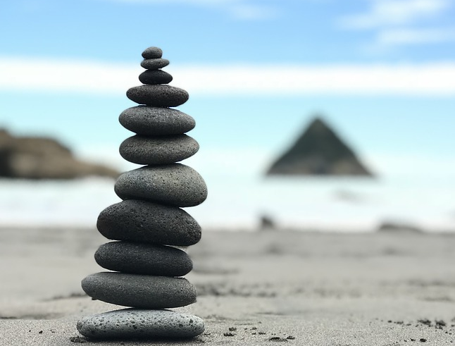 Balanced stack of rocks on a beach
