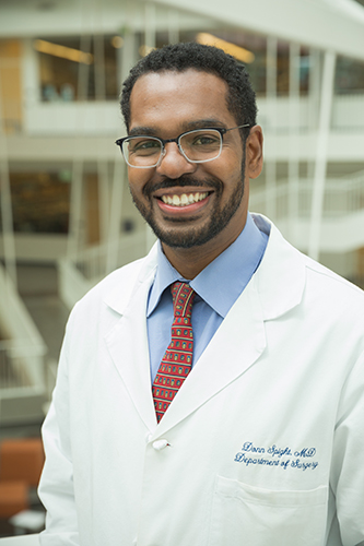 Portrait of Dr. Donn Spight in white lab coat
