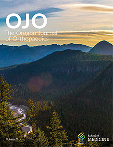 Oregon Journal of Orthopaedics cover image of mountains and river