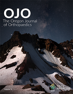 Oregon Journal of Orthopaedics cover image of rugged, snow-covered mountain
