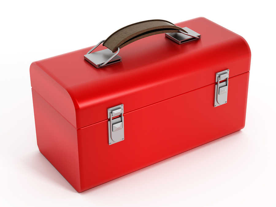 red metal toolbox with black handle and silver clasps.