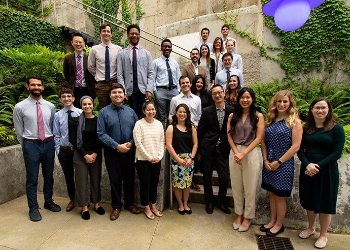 Ophthalmology residents and program leadership standing together for a group photo.