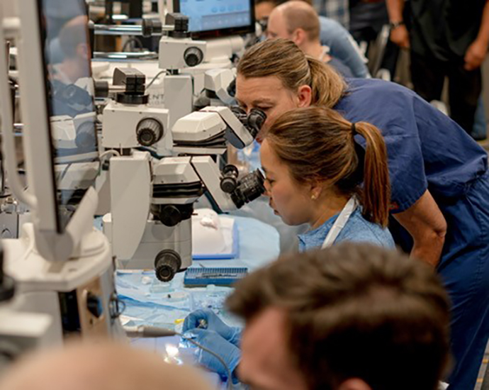 Ophthalmology resident Dr. Sarah Glass practices surgical skills in a wetlab. 