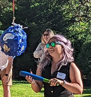 ORPRN Staff batting a pinata