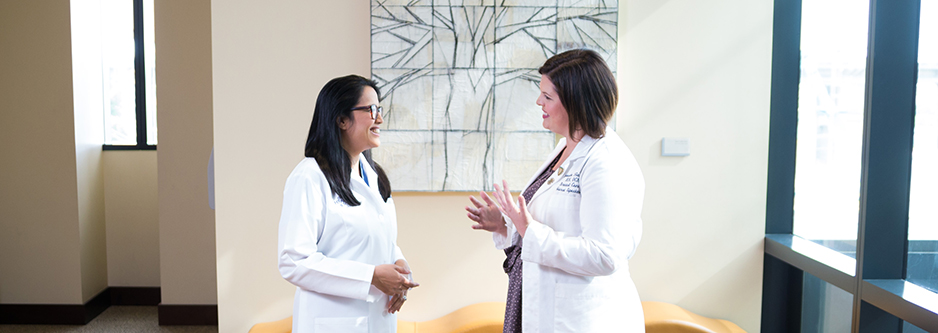 Dr. Arpana Naik (left) and Brooke Hambly, RN, (right) are two of the specialists who care for OHSU breast cancer patients. Dr. Naik is an expert cancer surgeon. Hambly is a certified cancer nurse and breast navigator who supports patients as they have breast imaging and biopsies.
