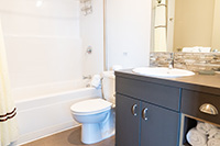 : Our standard private bathrooms have toilet, sink, shower tub with handrails, and towels provided.