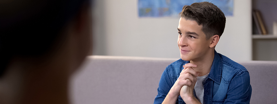 A young man feels hopeful as he talks with a care provider.