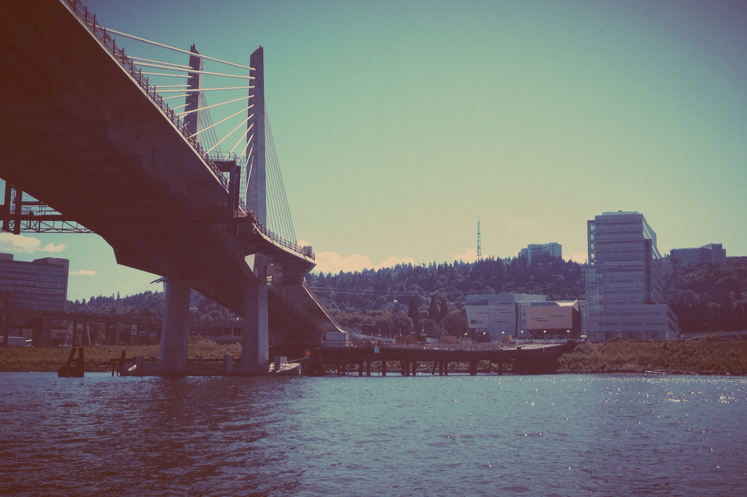 Photo of bridge, river, and buildings in Portland, OR