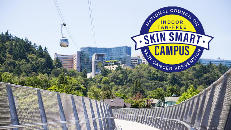 Image of Marquam Hill with sky tram in view with Skin Smart Campus logo