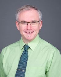Professional portrait of Brian Booty, CCRP, Clinical Research Manager for the Clinical and Translational Research Center at the Oregon Clinical and Translational Research Institute.