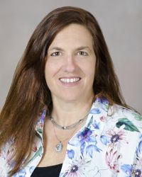 Professional portrait of Dr. Jodi Lapidus, Director of Biostatistics, Epidemiology, and Research Design for the Oregon Clinical and Translational Research Institute.