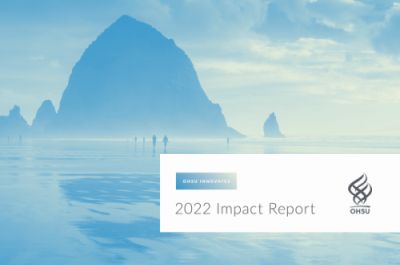 OHSU Innovates 2022 Impact Report with OHSU logo overlaid on an image of the big rock at Cannon Beach on the Oregon Coast. The big rock is reflected in the water and is surrounded by smaller bell-shaped rock.