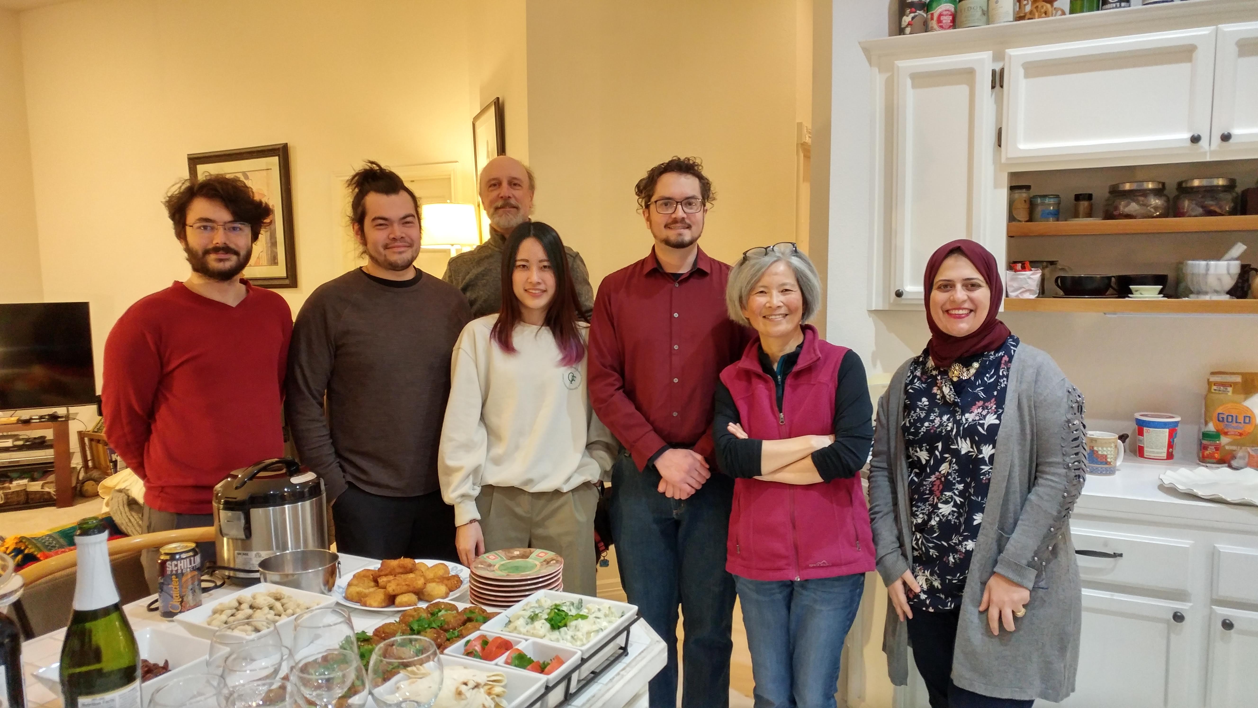 Members of Shyng lab gathered in a kitchen