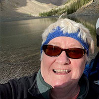 Selfie of Patty Carney in front of a lake at Banff National Park