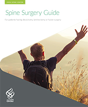 Cover page of spine surgery guide shows hiker outside raisning his arms