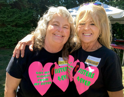 Terri Holde of Longview, Wash., (left) with her sister Gina Holde-White of Winlock, Wash., at the annual OHSU Transplant Picnic, July 21, 2018.