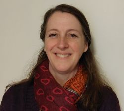 Professional portrait of Amy Yates, OCTRI Informatics Research Engineer.