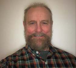 Professional portrait of Tim Kilgore, OCTRI Informatics Senior Research Engineer.