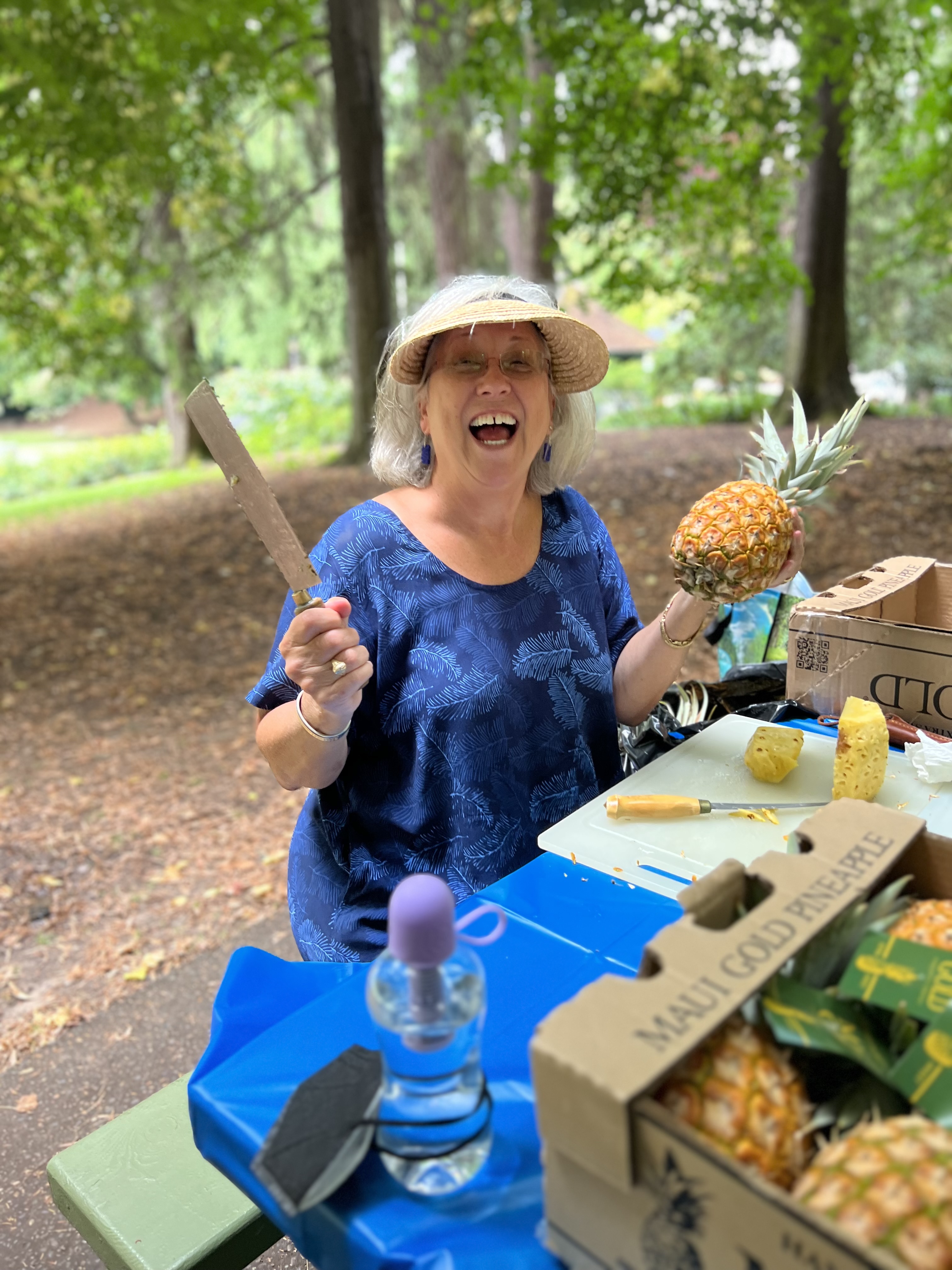 Lisa Coussens serving pineapple
