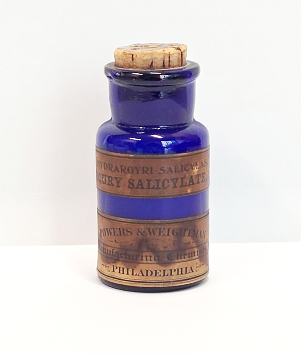 A blue bottle displays a label reading "mercury salicylate"