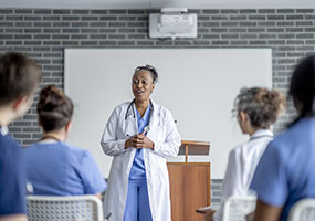 A nursing faculty member teaches to nursing students