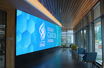 Digital sign in the lobby of the Knight Cancer Institute.