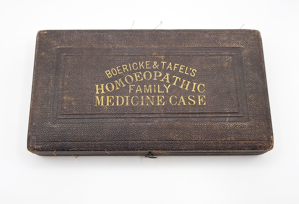 Brown leather case bears gold lettering "Boericke & Tafel's Homeopathic Family Medicine Case"