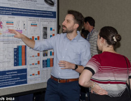 Matt Hagen explains his poster at Vascular Biology 2023. Credit William Huckle.