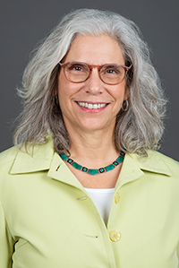 SON faculty member Cindy Perry smiles in a professional headshot.