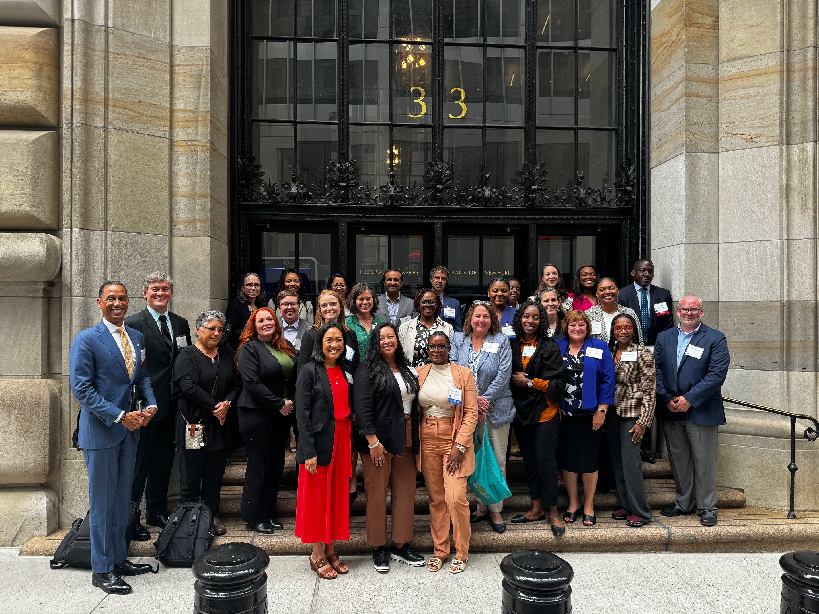 Anne King and Brian Frank, MD outside of the Federal Reserve Bank of NY