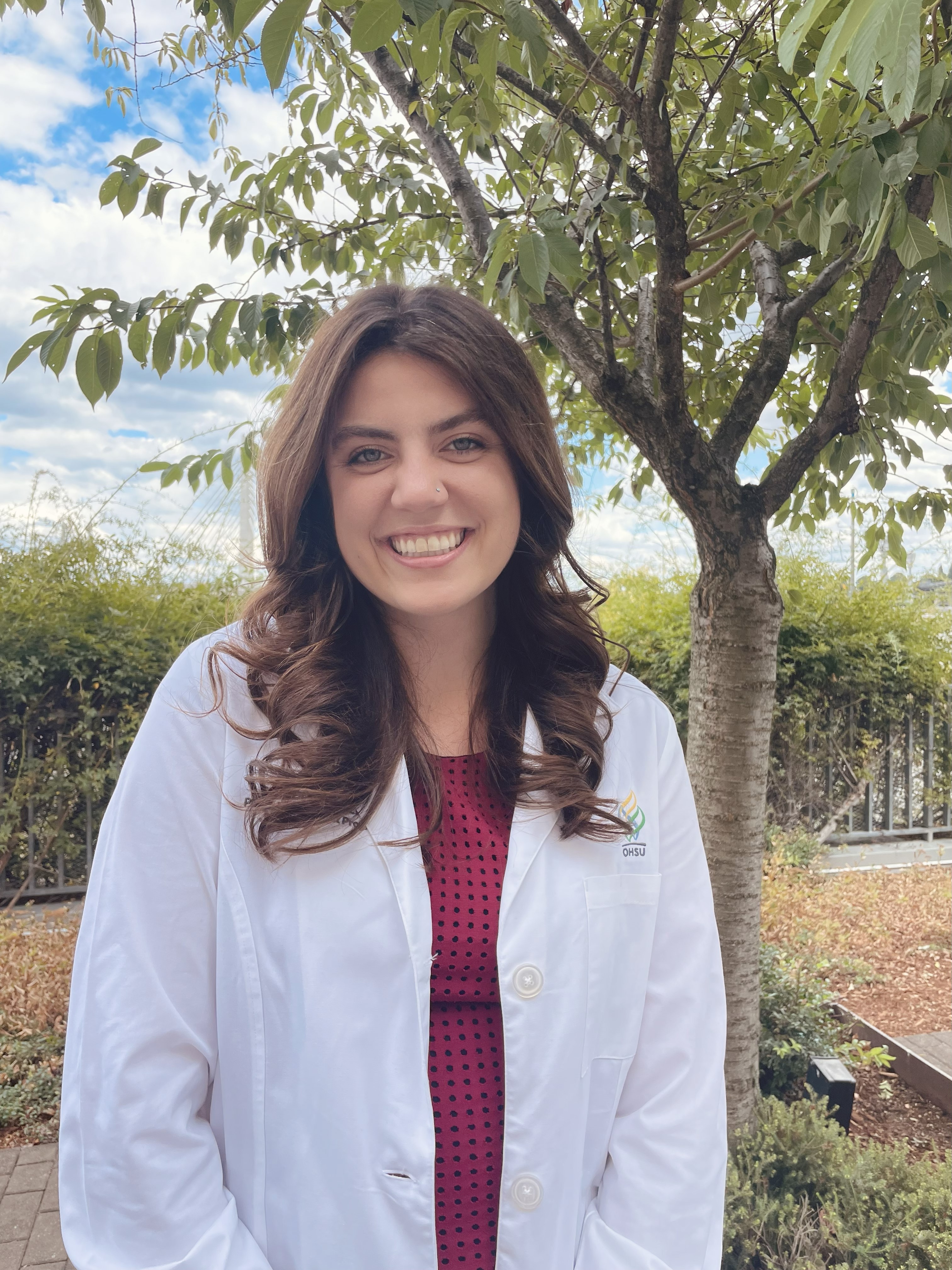 Lauren March in white coat