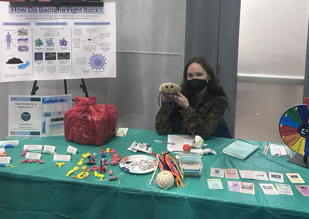 Marin at her booth at OMSI
