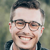 Professional headshot of Caleb Frank