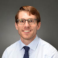 Professional headshot of Christopher Mayhew