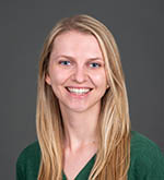 Professional headshot of Kaycee Moshofsky