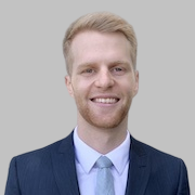 Professional headshot of Sam Moshofsky