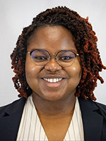 A professional headshot of Ndidi Njoku. 